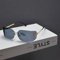 Gafas de sol tipo escudo sin montura en tono dorado