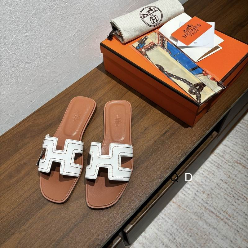 Sandalias planas de cuero