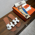 Sandalias planas de cuero