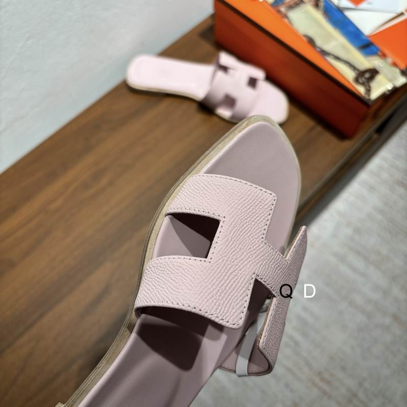 Sandalias planas de cuero