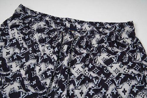 Monogram Swim Trunks